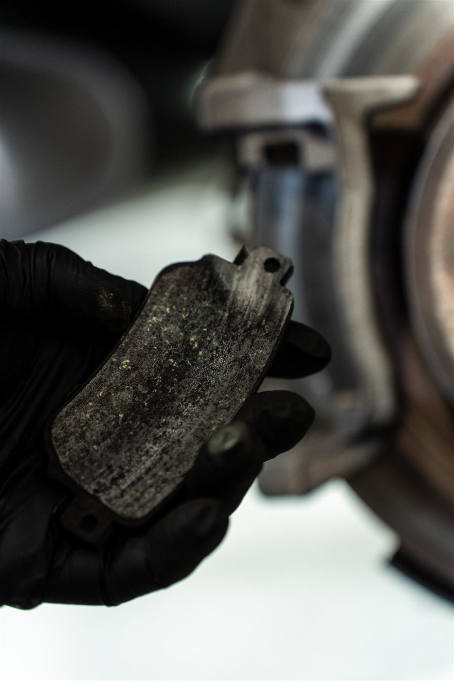 Brake pad inspection at Masters Garage